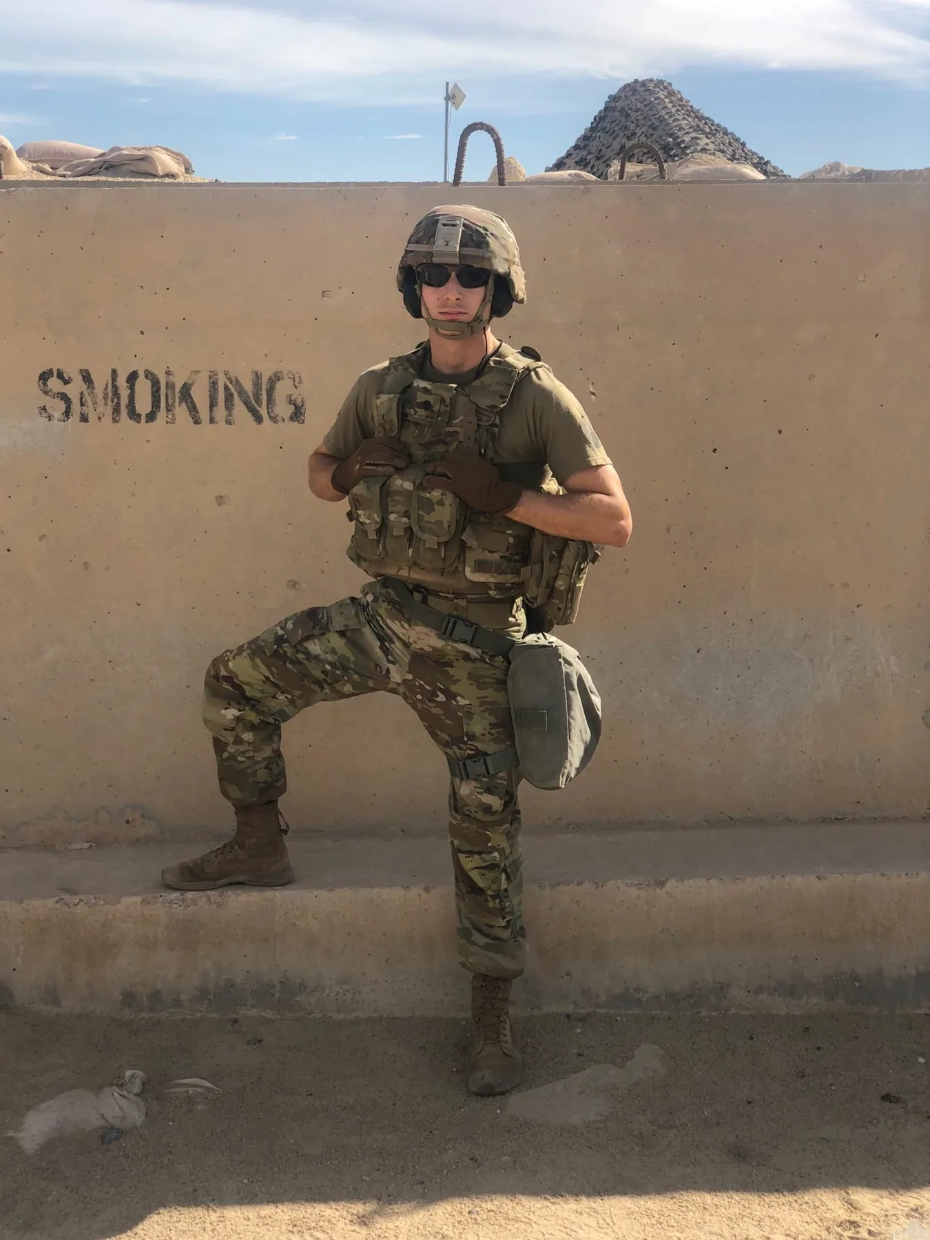 Full kit, helmet, sandbag wall